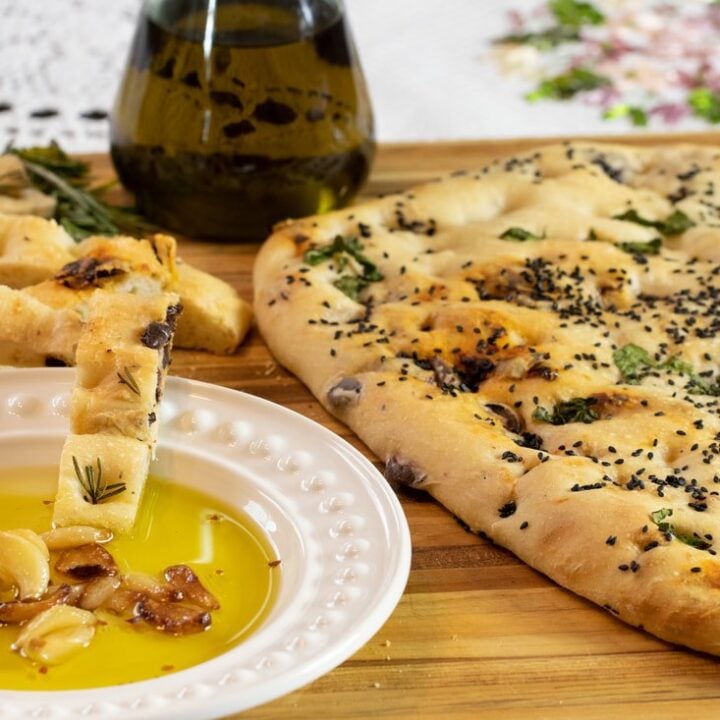 LAGANA BREAD: GREEK FLATBREAD FILLED WITH OLIVES, SUN-DRIED TOMATOES, & HERBS