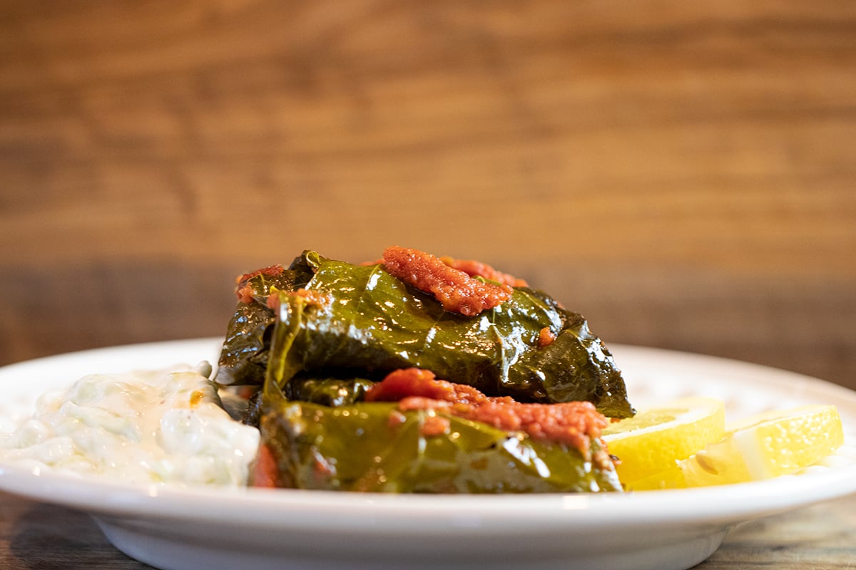 Greek Stuffed Grape leaves in Tomato Sauce Dolmadakia me Domata