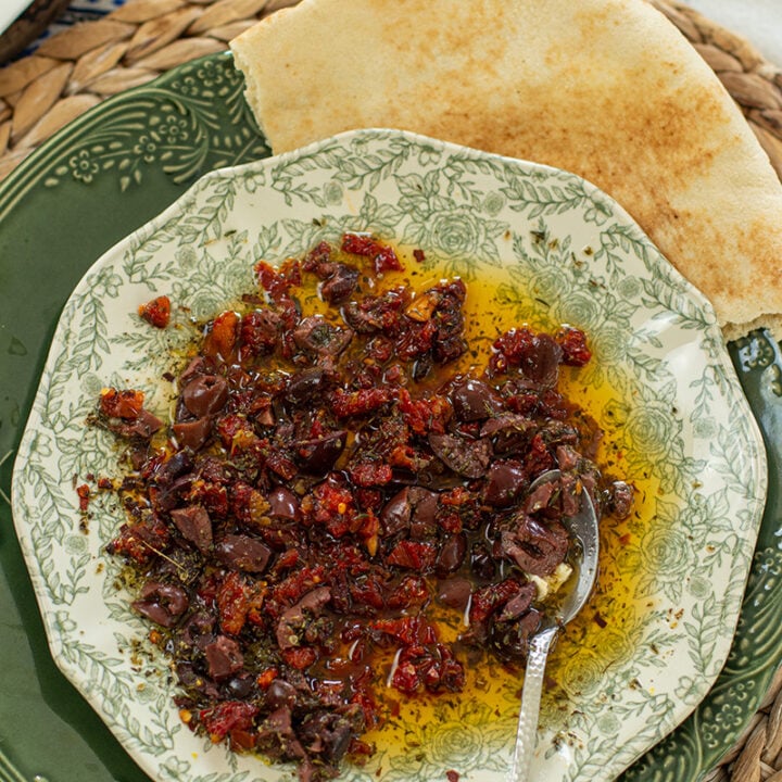 Loaded Greek Bread Dipping Oil with Olives, Sun-Dried Tomatoes & Feta
